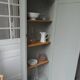 Bonnetière, a vintage, shallow dresser re-enchanted in verdigris with a waxed finish.