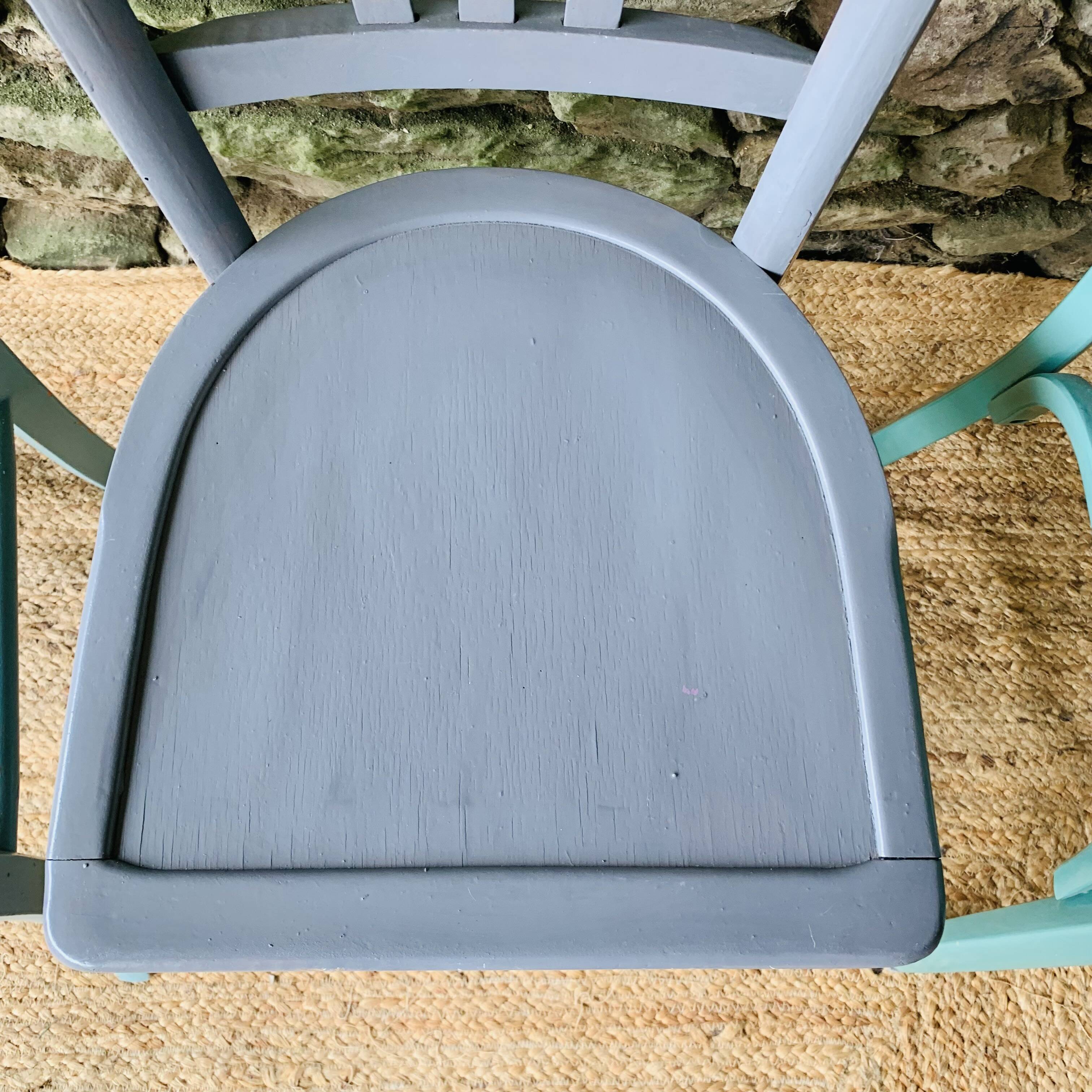 Set of four mismatched bistro chairs