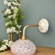 Vintage glass wall lamp with a white Clichy shade.