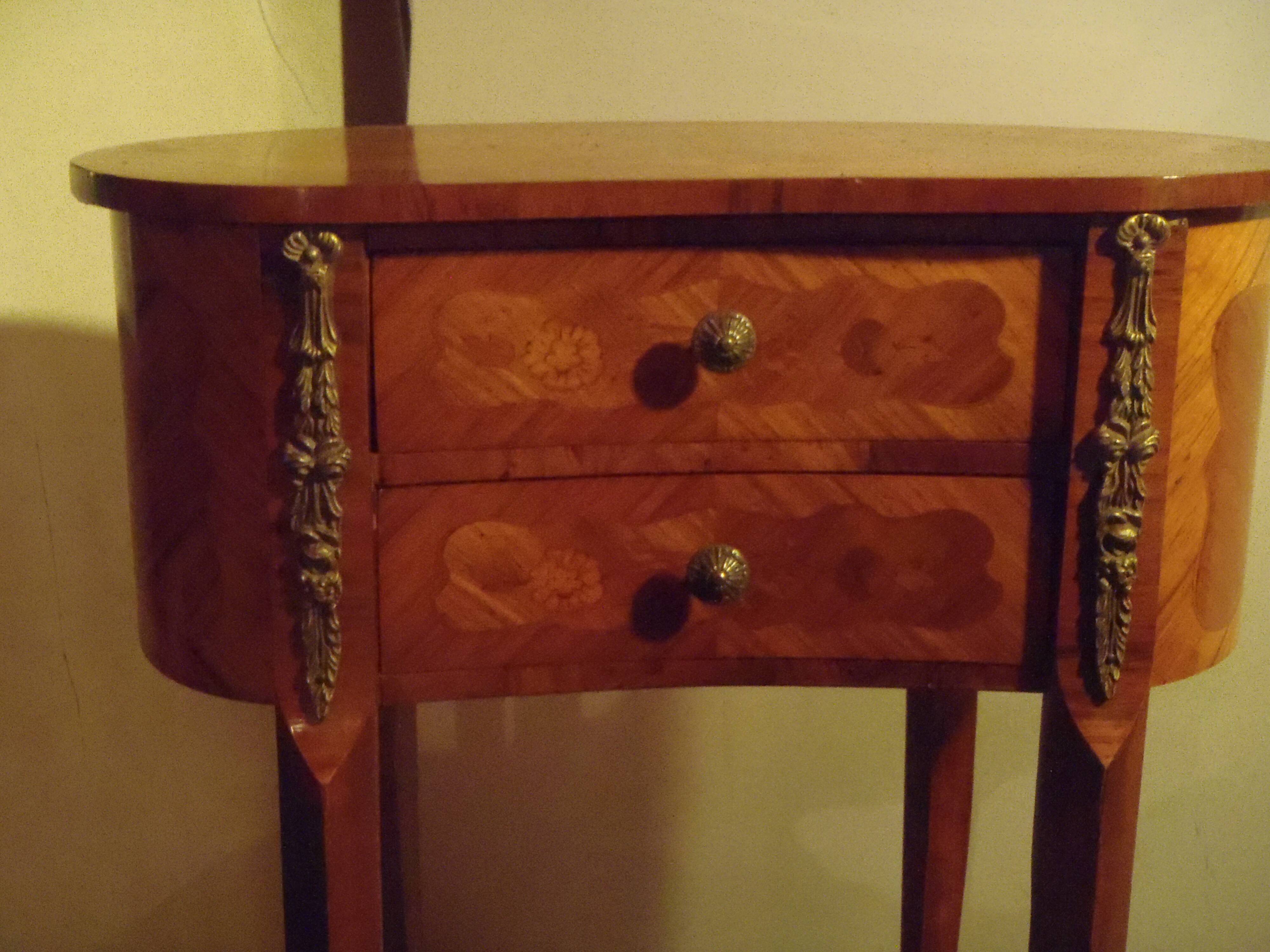 Louis XV style bedside table with varnished marquetry.
