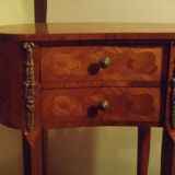 Louis XV style bedside table with varnished marquetry.