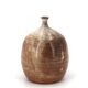 Ovoid vase with a small neck in brown beige ceramic and white drips.