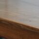 Antique French farmhouse table with two drawers and an extendable leaf.