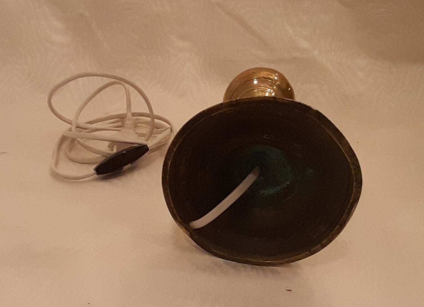 Old lamp foot in electrified brass