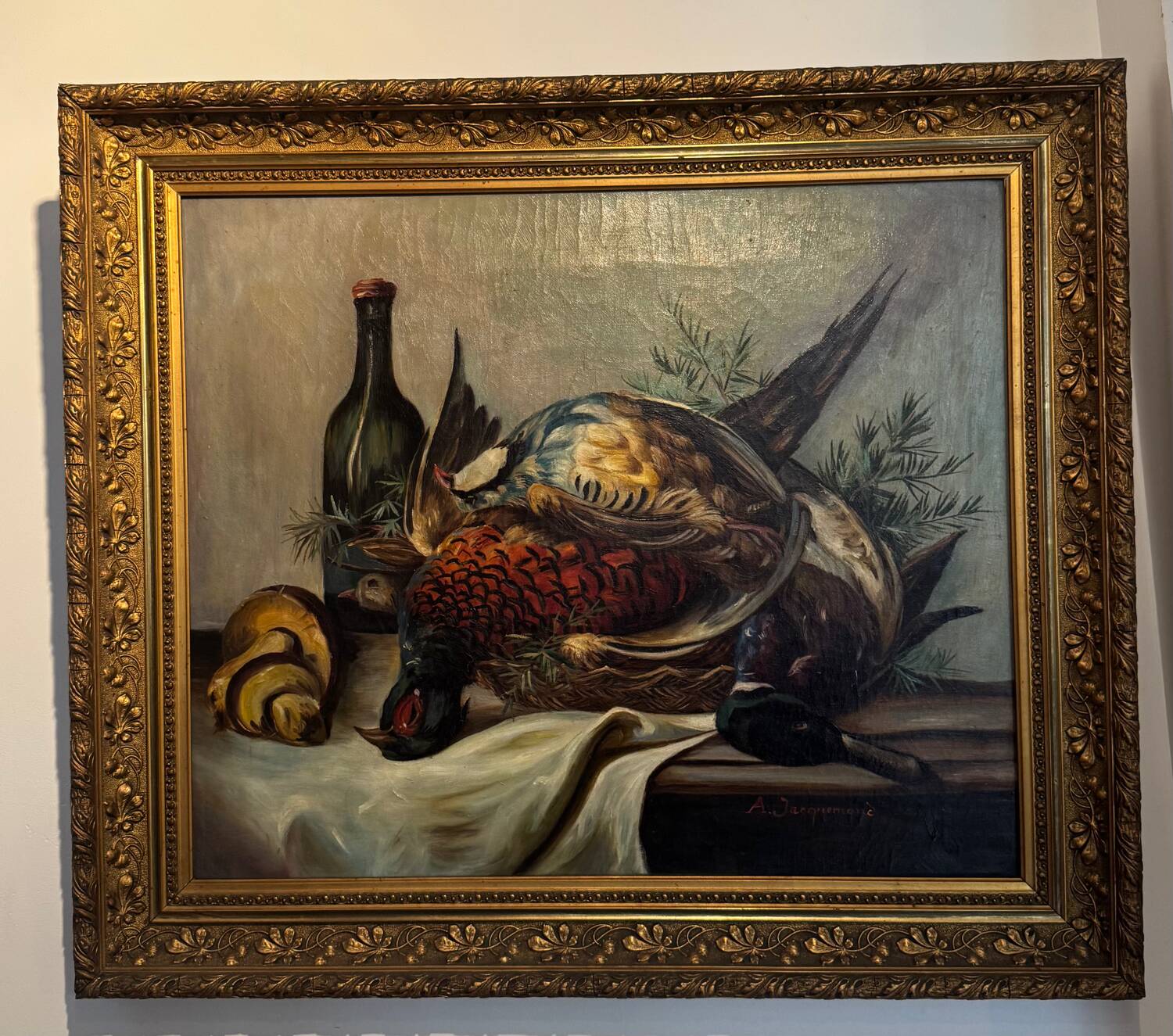 Still life with bottle and game, signed, 20th century