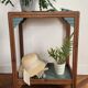 Art Deco side table with 2 sculpted tops