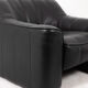 Maison De Sede. Armchair and its ottoman in black leather. 1970s.