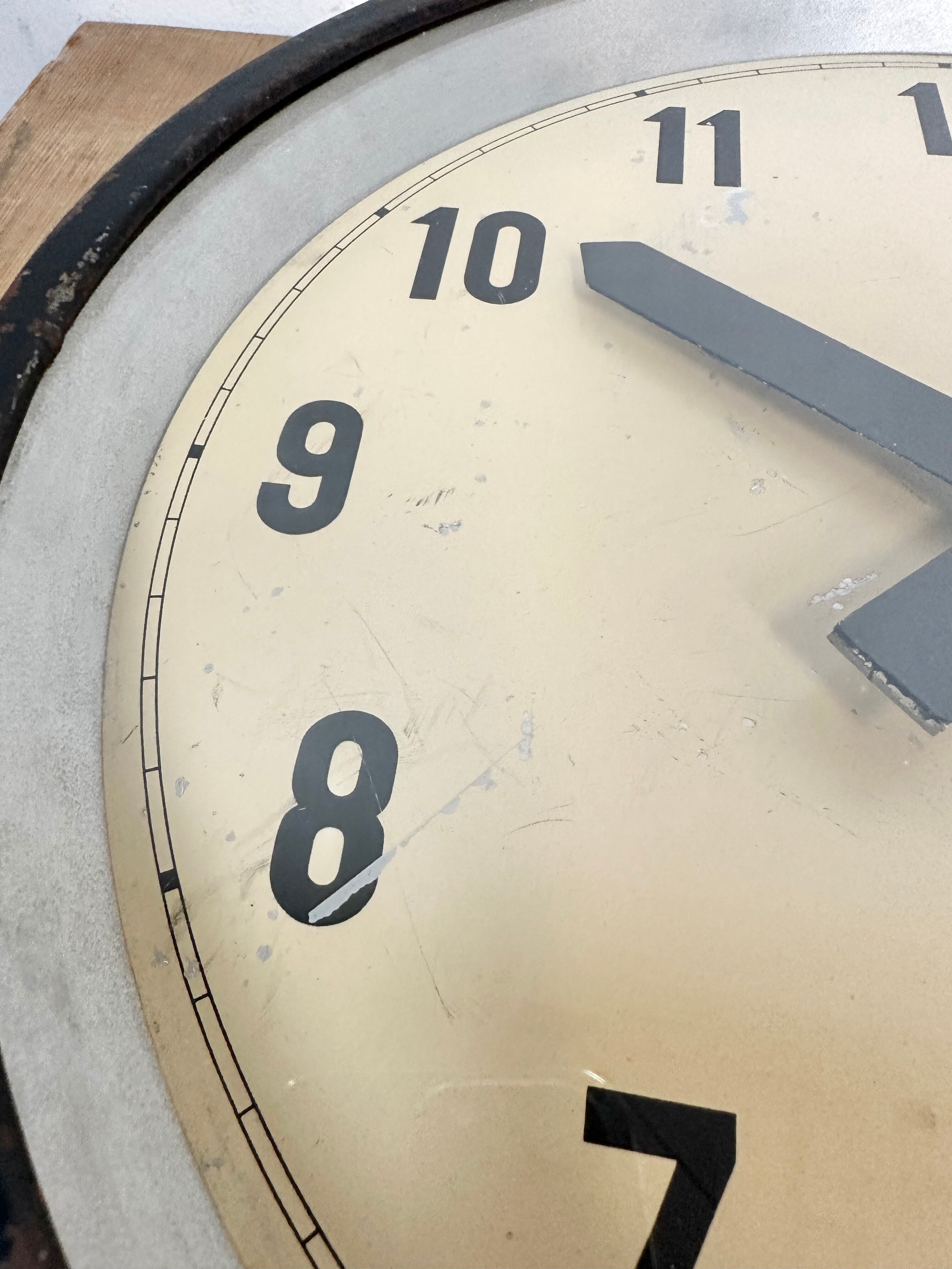 Black industrial factory wall clock from IBM, 1950s