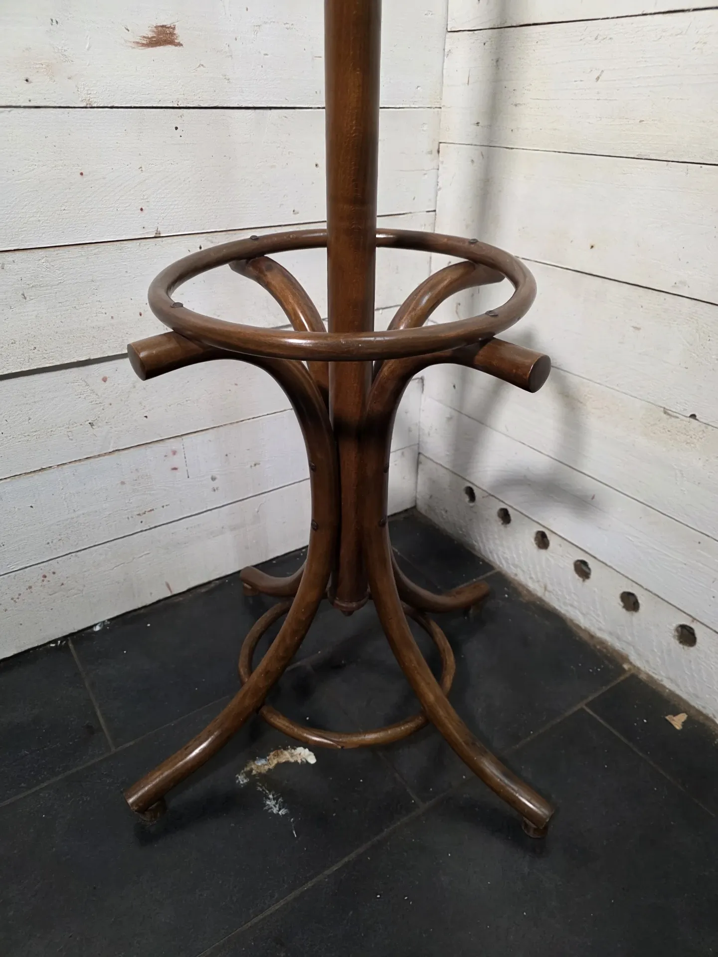 Curved antique wooden parrot