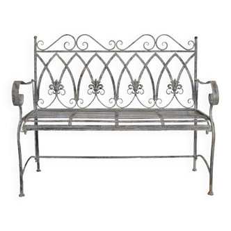 Garden bench with iron lily flowers