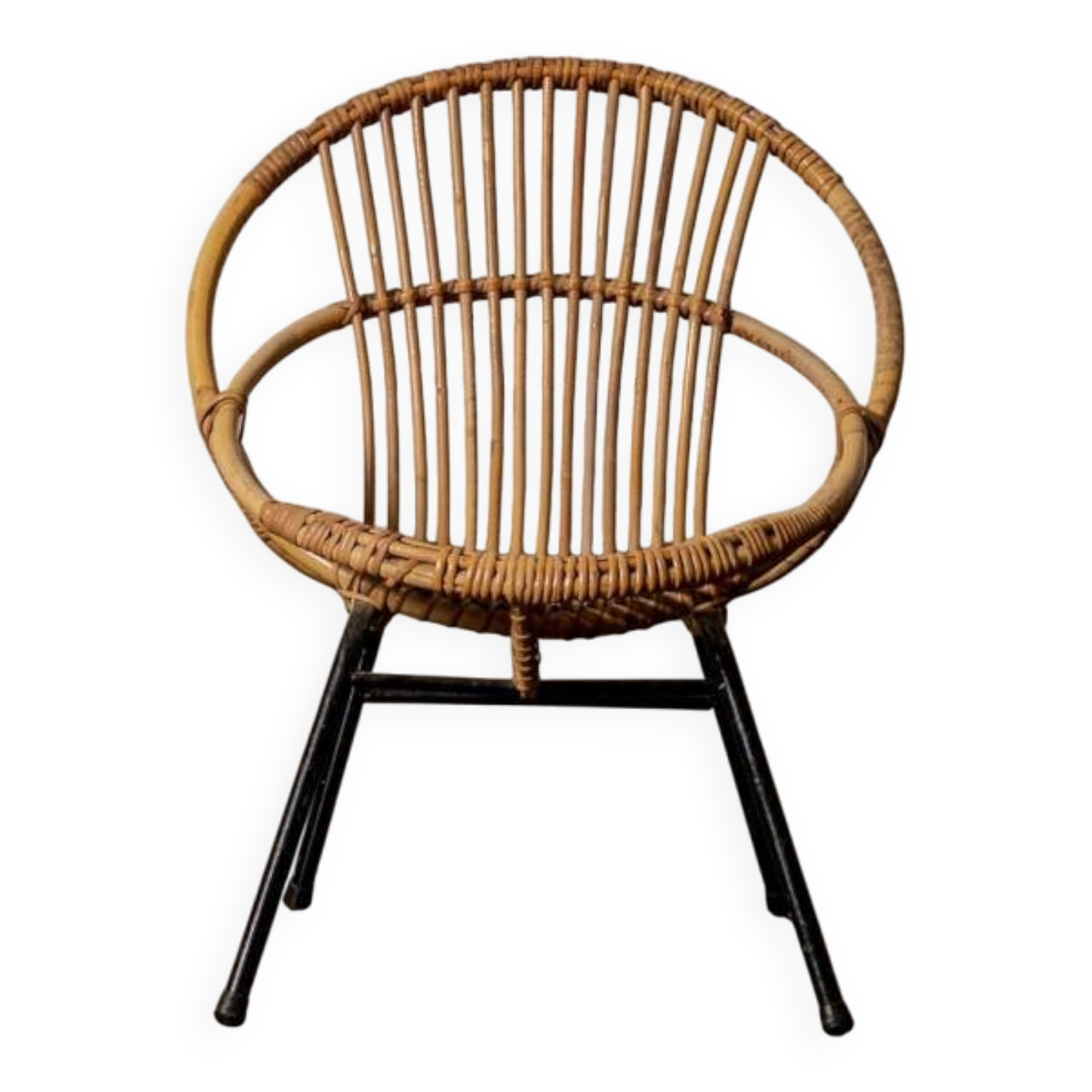 Rattan armchair with metal legs