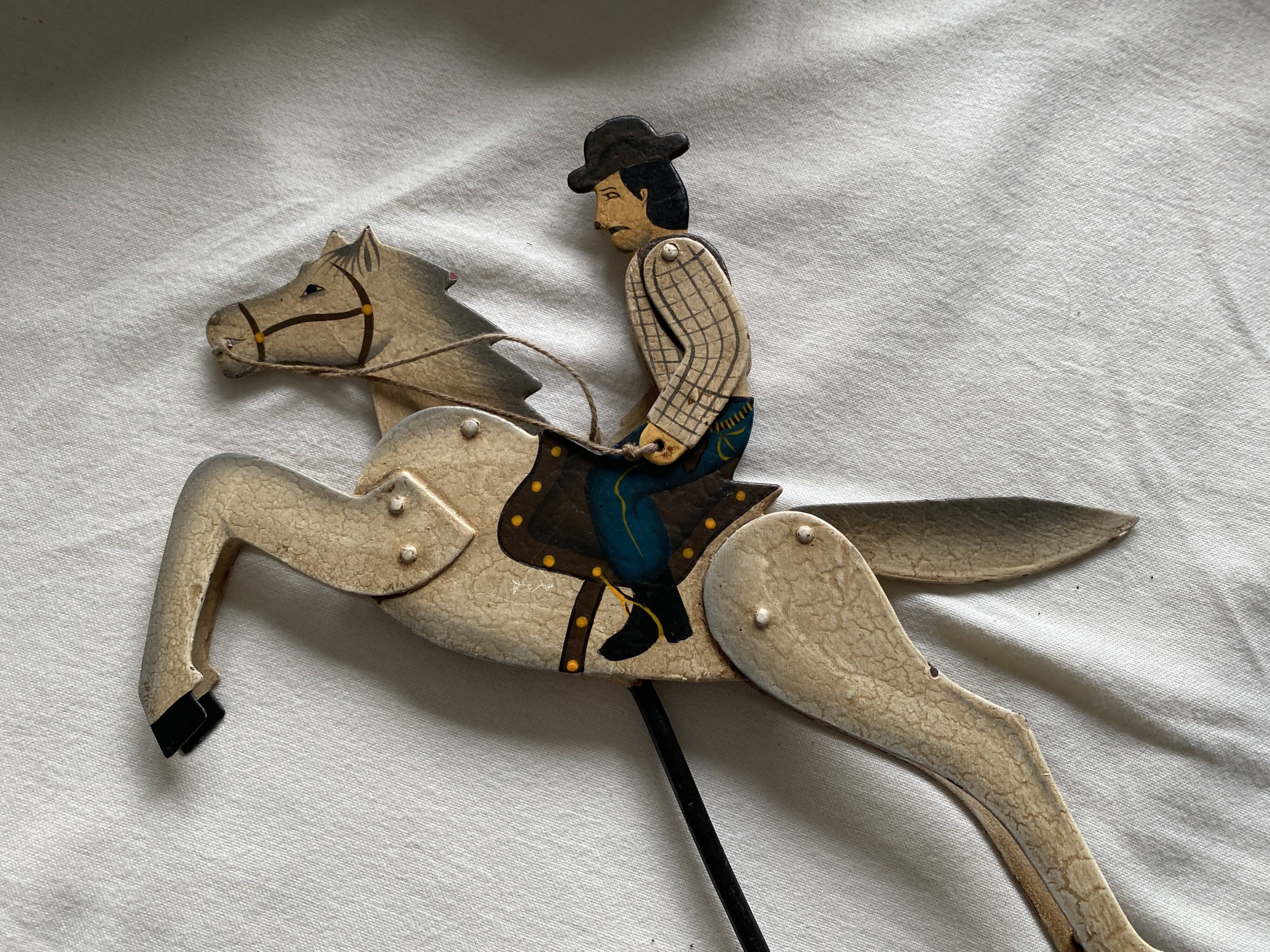 Rider and his horse in enamelled sheet metal rocking