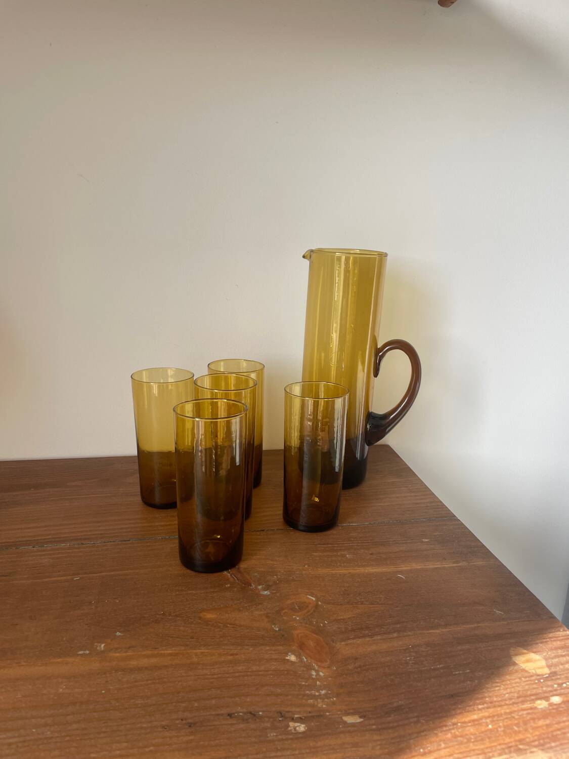 Amber blown glass orangeade service from the 1970s.