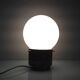 Lampe globe en opaline blanche sur socle bois