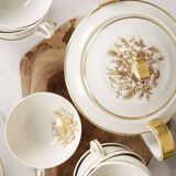 Porcelain tea service by Théodore Haviland, gilded patterns.
