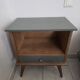 Renovated vintage bedside table in wood, with tapered legs – Matt green & gold background