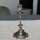 A large silver candlestick holder H23