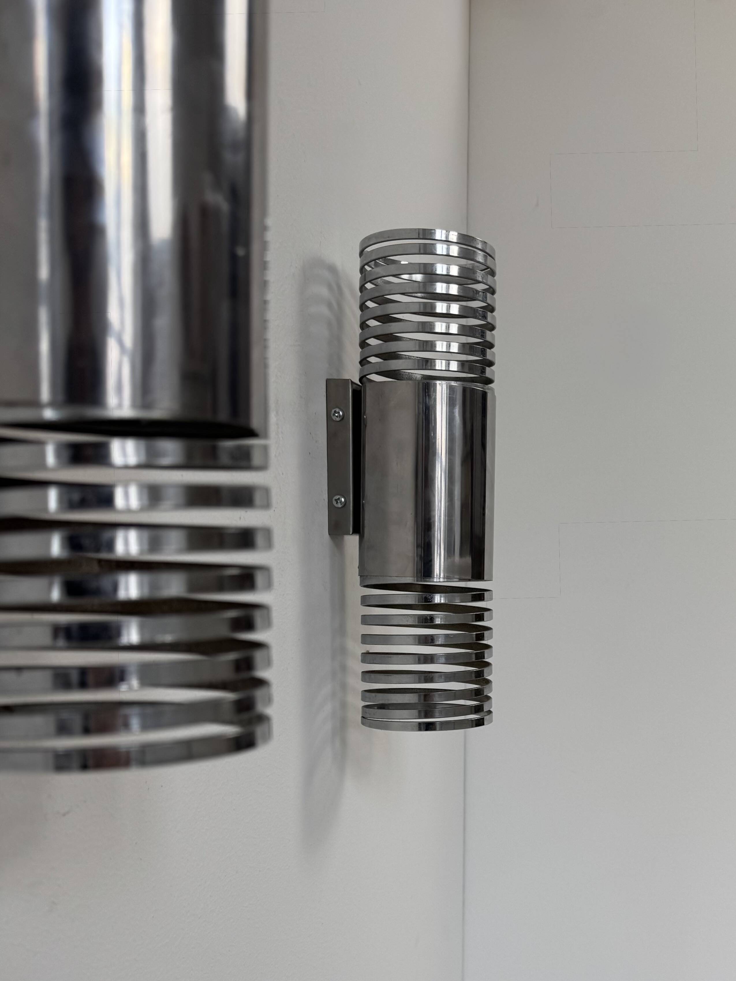 Pair of vintage chrome metal wall lights, France, 1970.