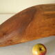 Brutalistic cut in exotic wood boomerang shape