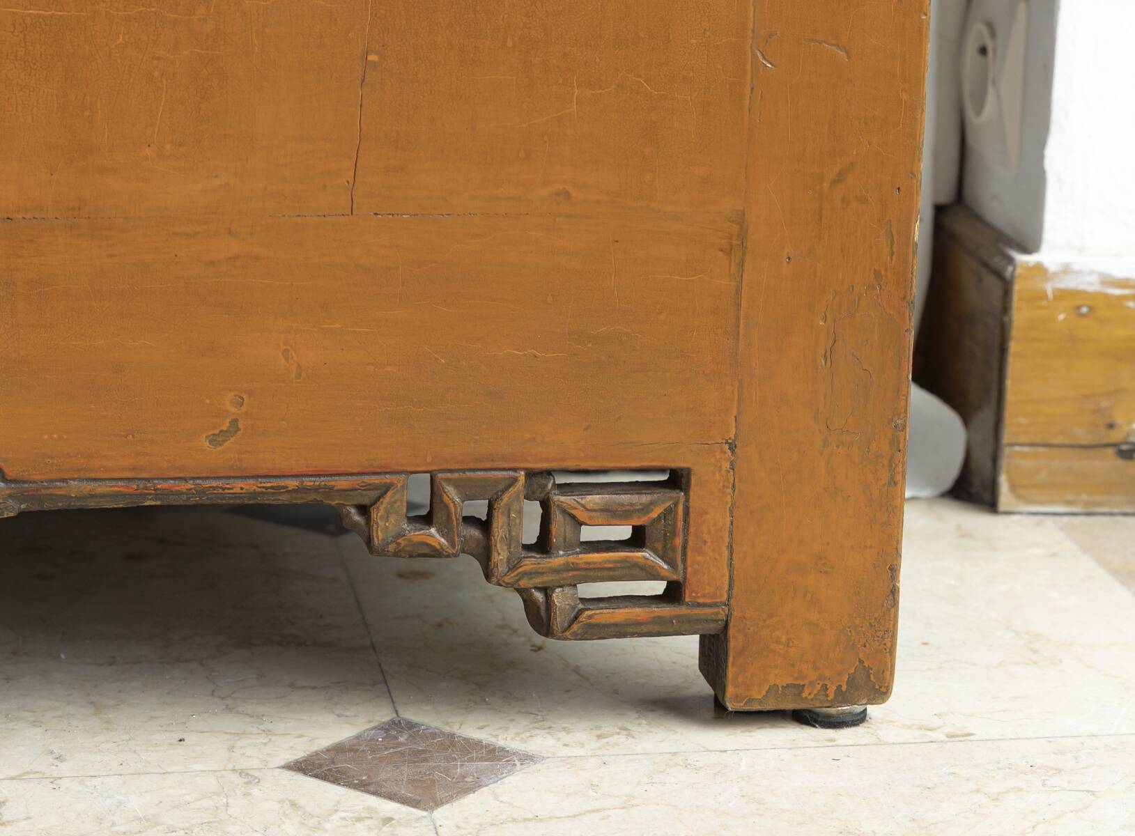 Low enfilade in orange lacquered elm