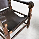 Pairs of vintage Safari style armchairs in wood and leather