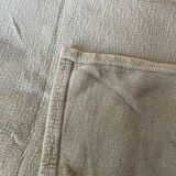 Almond-colored Caravan bedspread