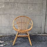 Fauteuil coquille en rotin vintage années  70 fabrication artisanale bohème