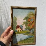 Small landscape painting with golden frame