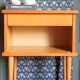 Nightstand in golden oak veneer. Around 1970.