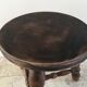 Tabouret en bois tourné tripode vintage