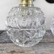 Pair of chiseled glass wall sconces