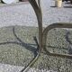 Silver metal table with smoked glass top from the 1970s.