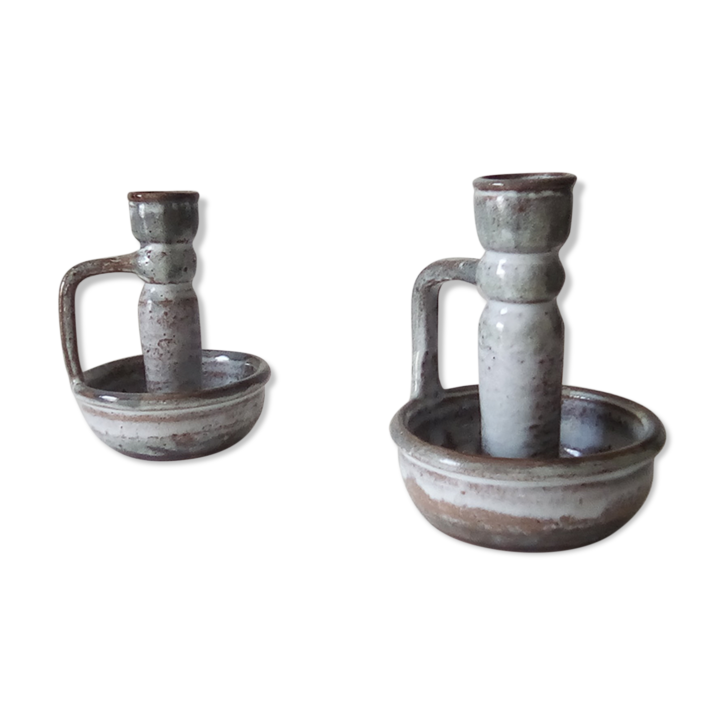 Pair of speckled sandstone candle holders