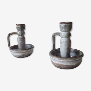 Pair of speckled sandstone candle holders