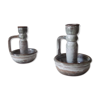 Pair of speckled sandstone candle holders