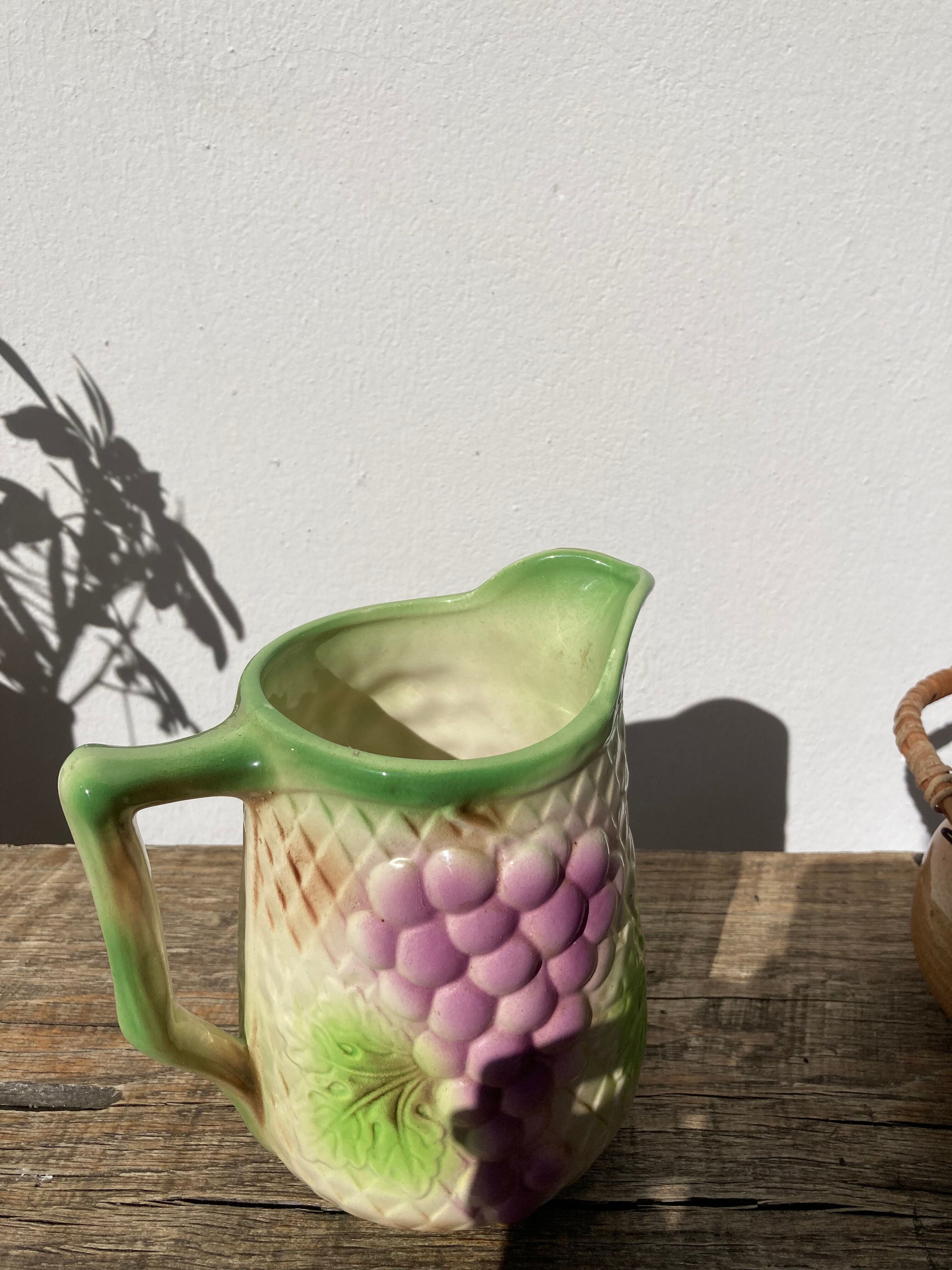 Pitcher in slip - earthenware Saint Clement numbered with fruit and grape basket decoration