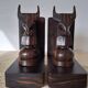 Pair of vintage wooden bookends with stylised horse heads.