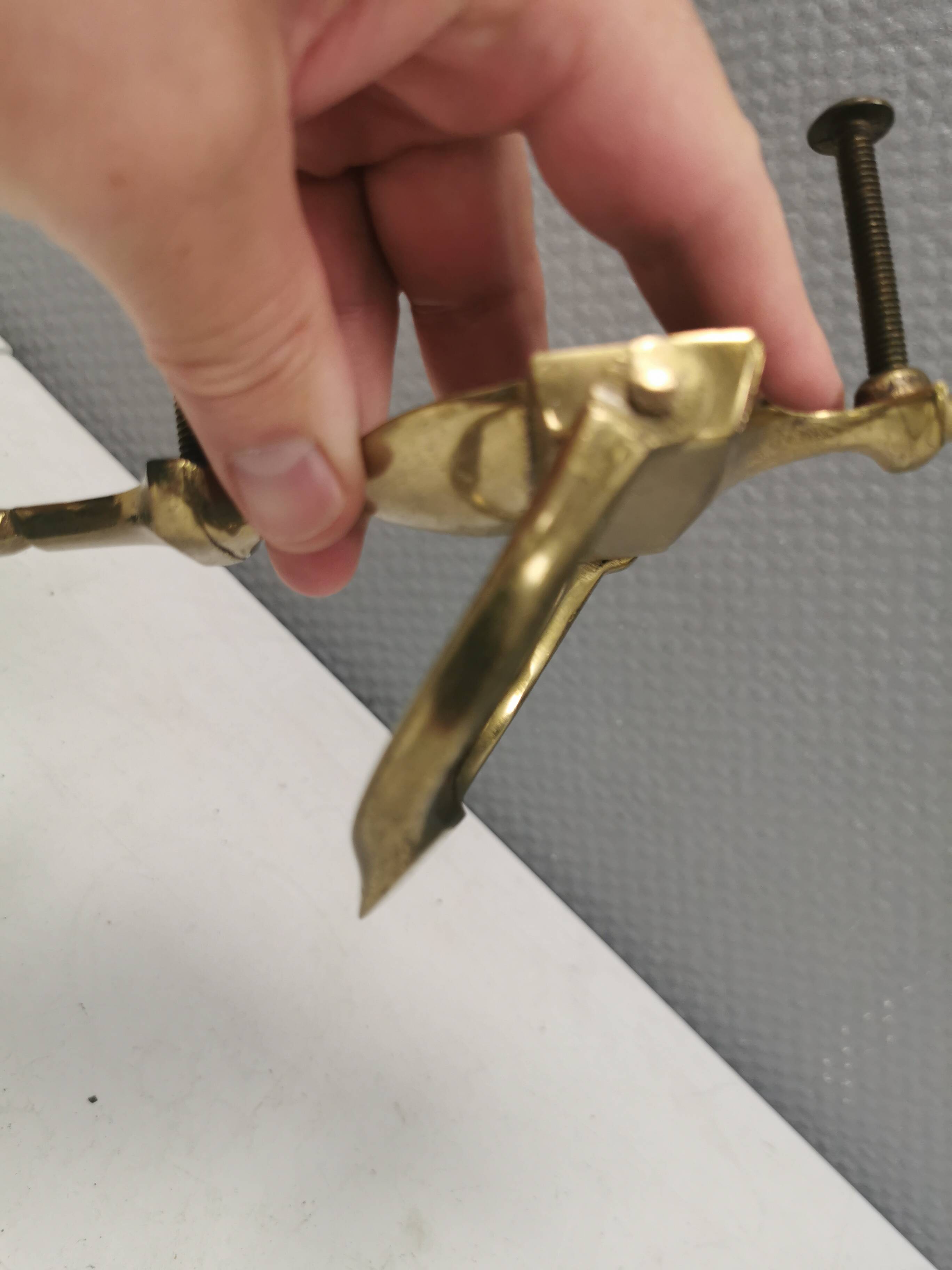 Old door hammer in solid brass. Estimated 1960s.