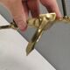 Old door hammer in solid brass. Estimated 1960s.