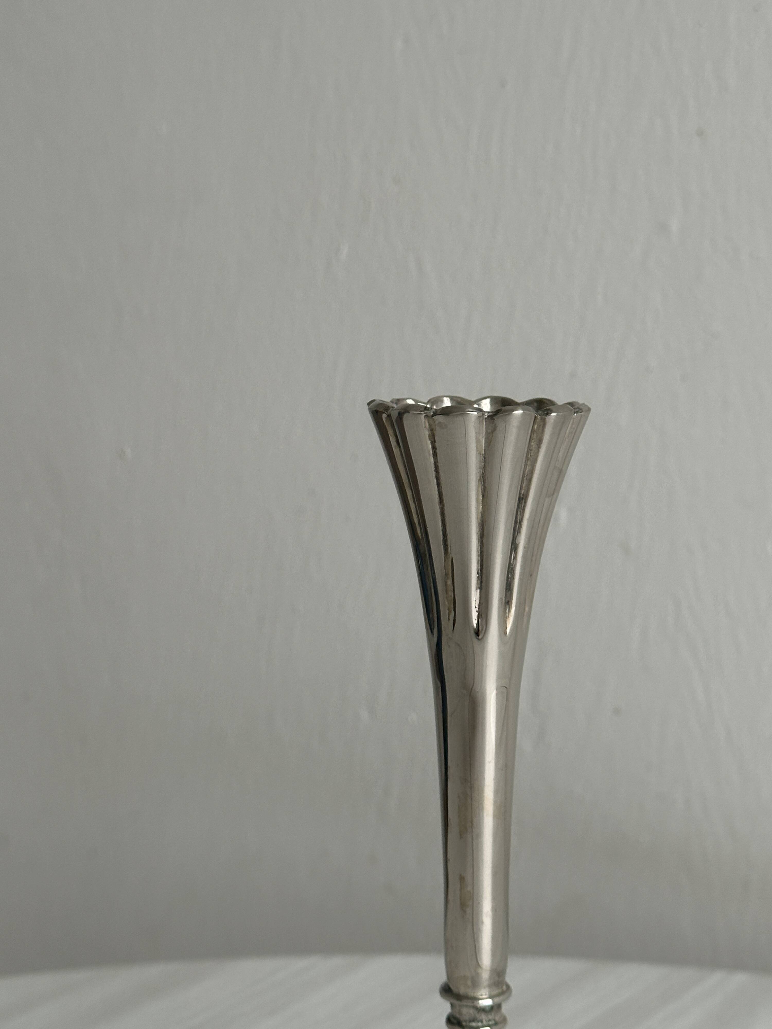 slender chrome metal candlestick