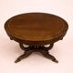 Table ronde Empire – acajou avec incrustations et pieds griffes
