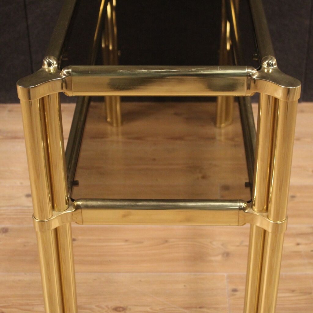 Italian console in gold metal