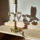 Rococo lamp, chiseled bronze base, fake candle and crystal pendants