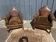 Pair of club armchairs in wood and leather, early 20th century.