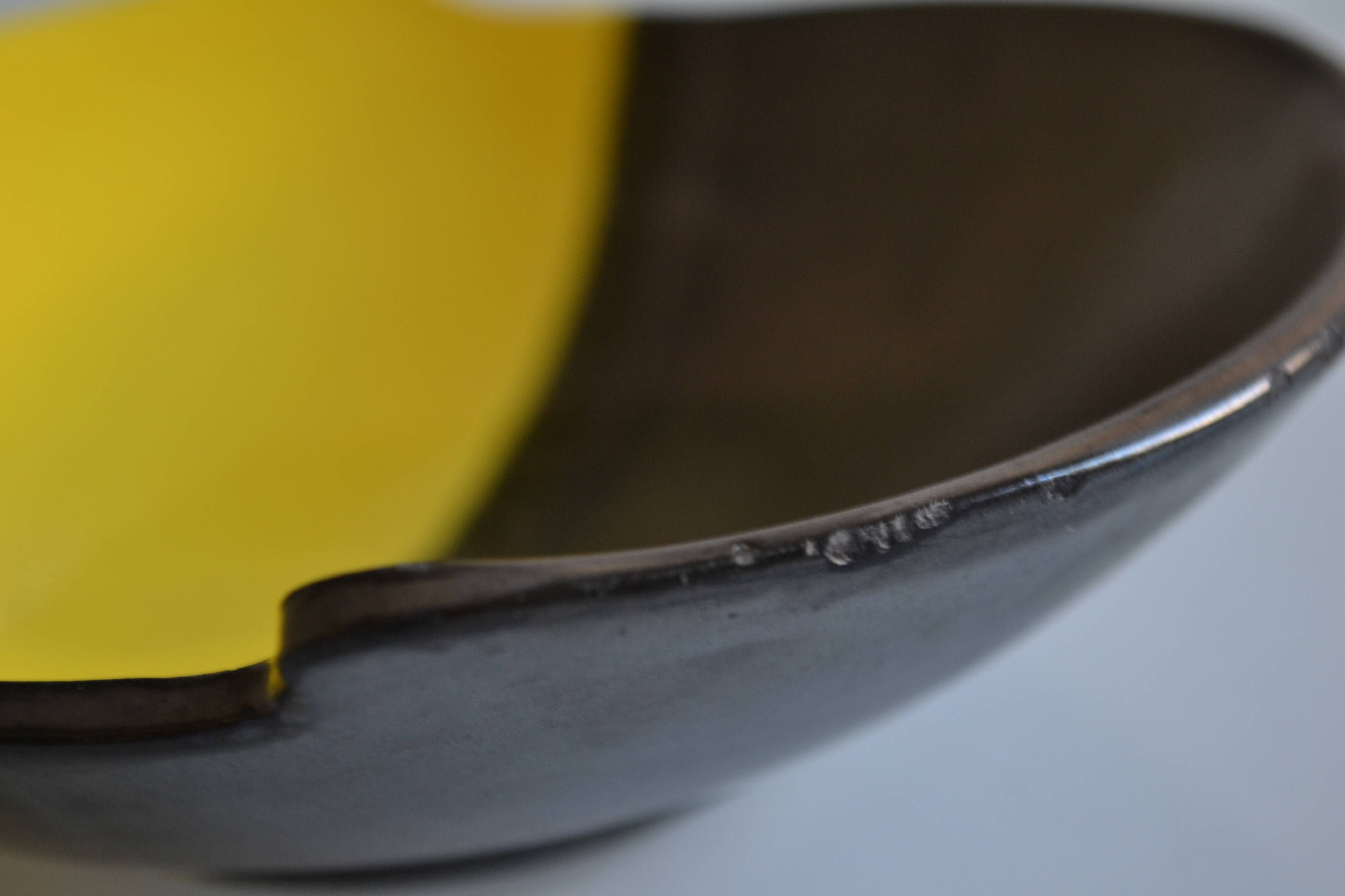 Bicolour ceramic cup in black and yellow signed Luc Vallauris 1950