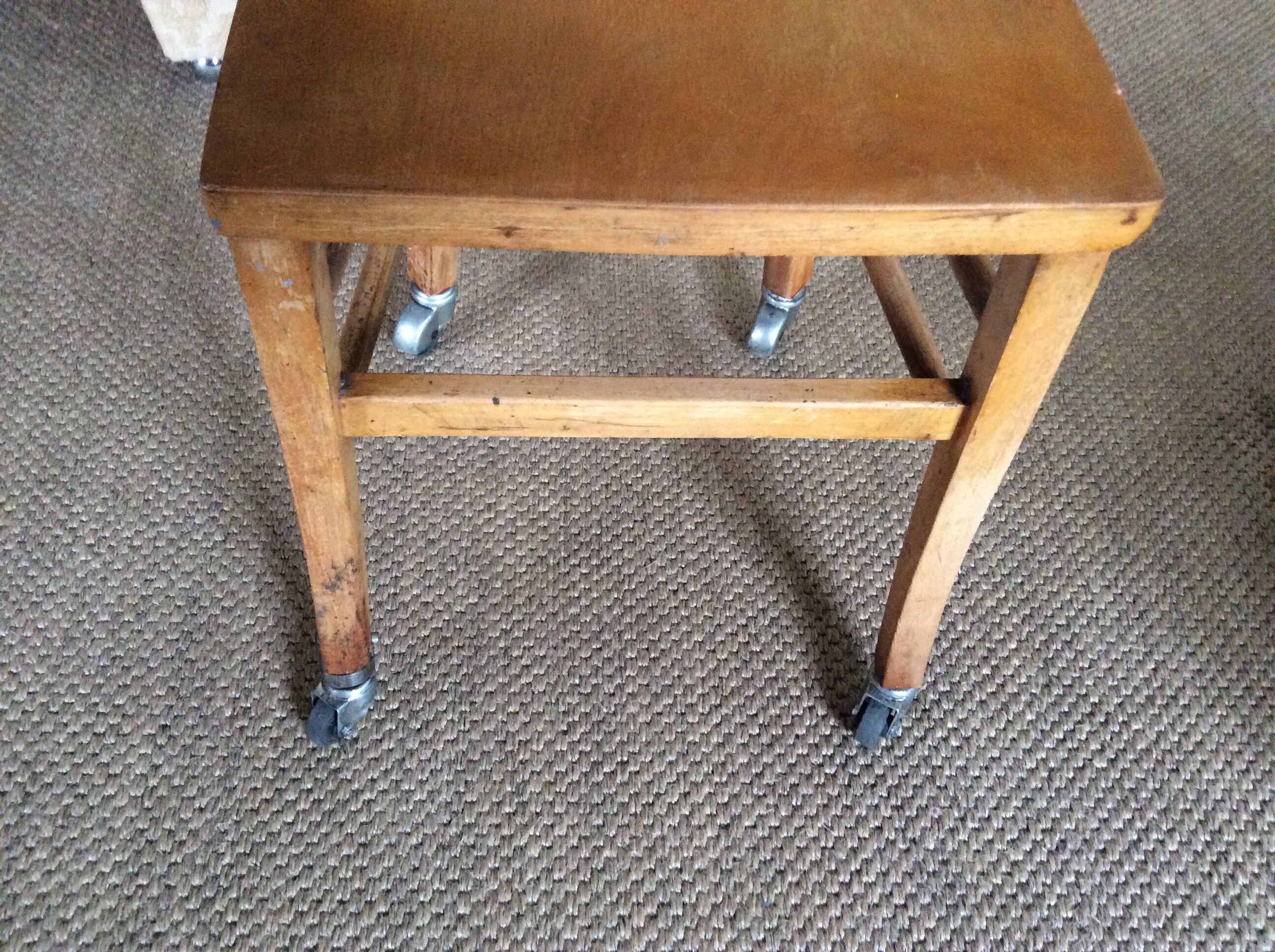 Wooden chair with wheels