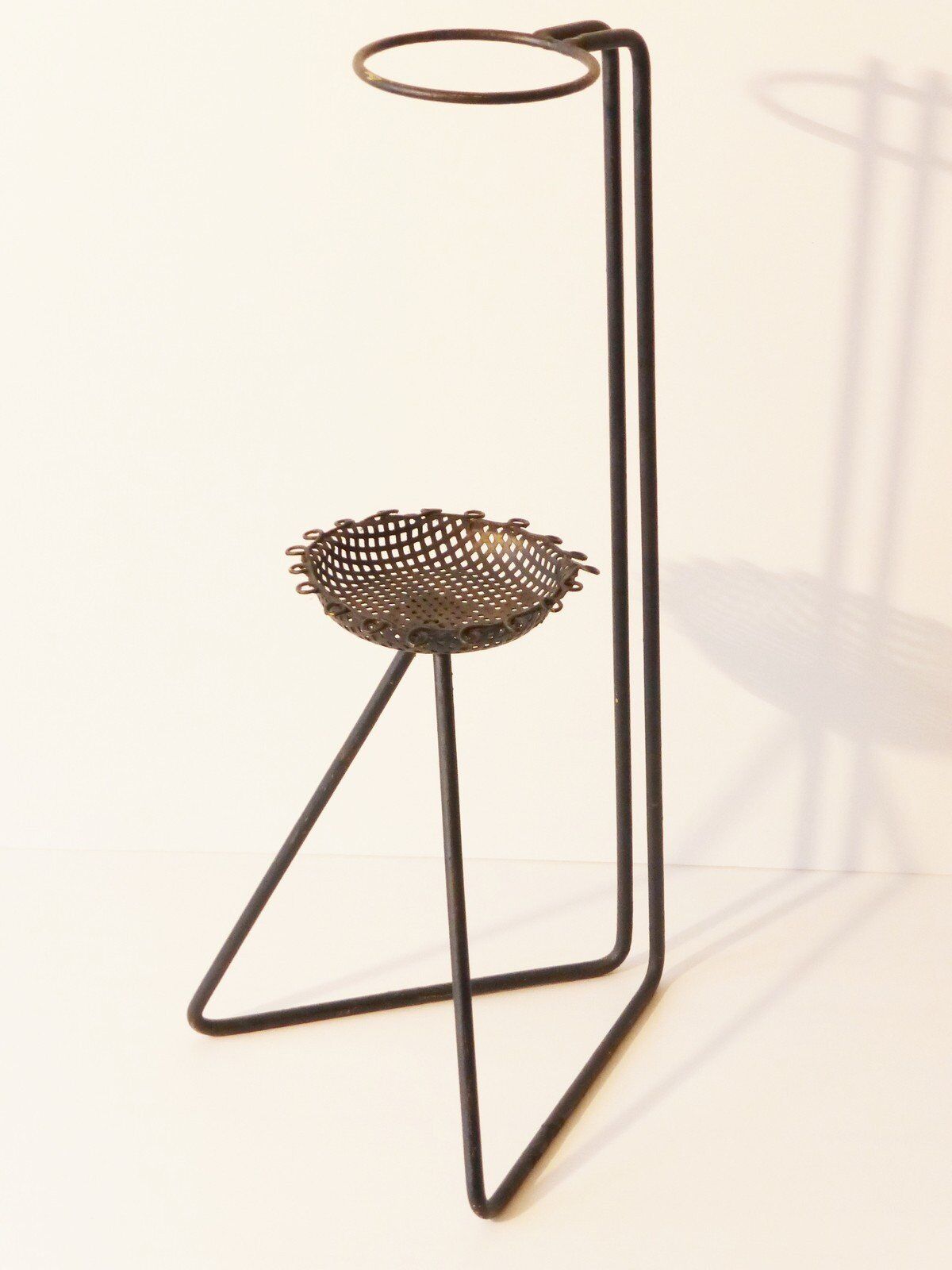 Perforated metal ashtray from the 1950s, vintage Rockabilly.