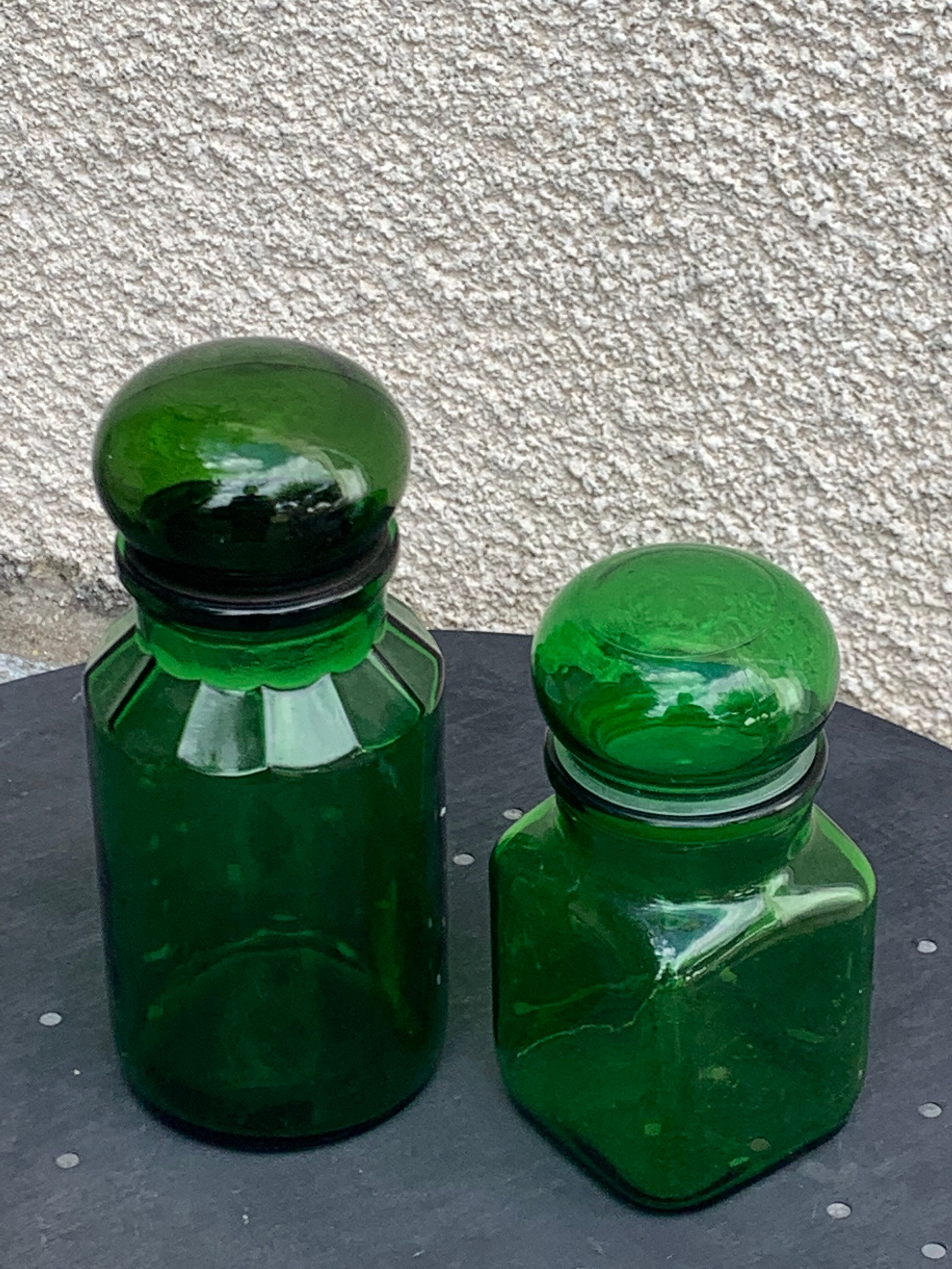 Two jars in green glass advertising vintage 1970