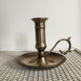 Old brass candlestick called "rat tail"