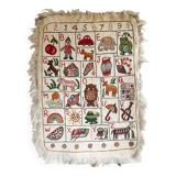 Vintage alphabet wall rug